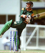 Herschelle Gibbs of South Africa bats during his century, at the second Cable and Wireless one-day international match against West Indies at the Antigua Recreation Grounds in St Johns, Antigua, on Wednesday.