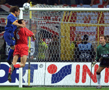 Alonso Ivan of Deportivo Alaves outjumps Markus Babbel of Liverpool to score as Liverpool goalie Sander Westerveld looks on during their UEFA Cup final at Dortmunds Westfalen stadium on Wednesday. Liverpool won 5-4 after extra time.