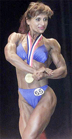 Ukrainian Olga Novik wears her gold medal that she won in 52kg weight category at the 23th Womens European Bodybuilding Championship in Ukraine's capital Kiev on Sunday.