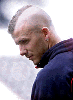 England captain David Beckham, shows off his new haircut 