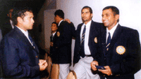 Indian cricketers Sachin Tendulkar (left) and Sameer Dighe engrossed in discussion prior to their depature to Zimbabwe.