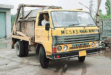 A vehicle of the SAS Nagar Municipal Council being used without the mandatory registration number.