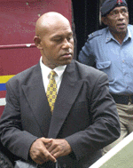 Fiji coup leader George Speight arrives in Suva from his island prison to face a committal hearing for treason on Tuesday
