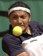 Argentinian Paola Suarez eyes a ball during her second round match against Belgiums Justine Henin at the French Open in Roland Garros, Paris on Wednesday. 