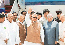 Prime Minister Atal Behari Vajpayee waves at the Chandigarh Airport on Wednesday on his way to Delhi from Manali.