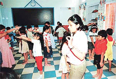 Lovleen Mishra interacts with kids at a summer school organised by the Durga Das Foundation, Sector 24, in Chandigarh on Friday.