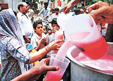 Sweetened water being distributed at a chhabil on the occasion of Nirjala Ekadashi in Chandigarh on Saturday. 