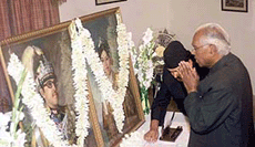 President K. R. Narayanan pays floral tributes to the portraits of King Birendra and Queen Aishwarya at the Nepal Embassy in New Delhi on Sunday. 
