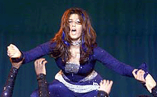 Bollywood actress Twinkle Khanna performing a dance at Sansui viewers choice movie awards function in New Delhi on Saturday. 
