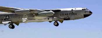 A NASA B-52B lifts off from Edwards Air Force Base, Calif., on Saturday with the experimental X-43A jet coupled to the right wing.