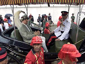 New Nepalese king Gyanendra sits in a carriage.