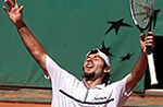 Sebastien Grosjean of France reacts after winning his match against Galo Blanco of Spain in the French Tennis Open at Roland Garros Stadium on Monday.  
