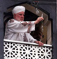 Ghulam Hassan Banday, Priest of Hazratbal Shrine displays the relic of prophet Mohammed on the occassion of Eid-e-Milad at Hazratbal on the outskirts of Srinagar on June 5, 2001. 