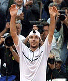 Sebastien Grosjean of France reacts after defeating Andre Agassi of the USA in the quarterfinal at the French Open at Roland Garros on Wednesday.