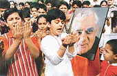 Schoolchildren pray for the health of Prime Minister Atal Behari Vajpayee as he undergoes surgery on his right knee in Mumbai on Thursday. 