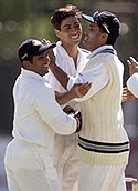 Indian bowler Ashish Nehra (C) celebrates his dismissal of Zimbabwe batsman Stuart Carlisle with skipper Sourav Ganguly and wicketkeeper Samir Dighe on Saturday. 