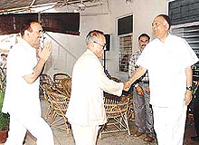 Governments interlocutor K.C. Pant with Congress leaders Pranab Mukherjee and Gulam Nabi Azad at his residence in New Delhi on Saturday to exchange views on the Kashmir problem. 
