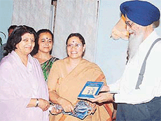 The Governor of Uttaranchal, Mr Surjit Singh Barnala, releases a book on the history of struggle of Uttarakhand written by Dr Indu Tewari at Raj Bhavan in Dehra Dun.