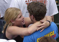 Jenna Bush, left, daughter of President Bush, hugs an unidentified friend after their alma mater, Austin High School, lost to Midland 4-2 in the Class 5A finals of the state baseball tournament, on Saturday, in Round Rock, Texas. 