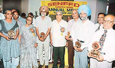 Some of the senior citizens after being honoured at a function by the Senior Citizens Federation, North Zone, in Red Bishop, Panchkula, on Sunday.