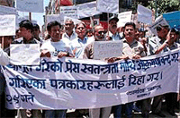 Journalists hold a protest march.