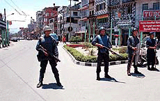 Policemen guard the streets of Kathmandu.