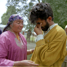 One of the arrested Kashmiri youths meets his mother at an army camp at Sopore in Baramullah district of north Kashmir on Wednesday.
