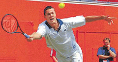Russian Marat Safin stretches for a shot against the Dutch player Peter Wessels during the Stella Artois Tennis Tournament at Queens Club, London. 