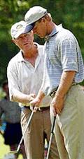 Four-time U.S.Open champion Jack Nicklaus (left) talks with his son, Gary, who played the 5th hole during a practice round at the Southern Hills Country Club in Tulsa, Okla, on Wednesday.