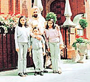 Homing in: Narinder Singh Gill with his children