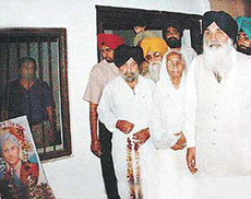 The Punjab Chief Minister, Mr Parkash Singh Badal, pays tributes to Kartar Singh Sarabha at the martyrs ancestral house in Sarabha village before a sangat darshan programme on Saturday. 