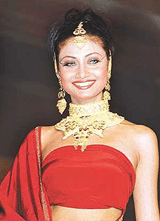 An Indian model displays gold jewellery during a fashion show in Kolkata on Friday.