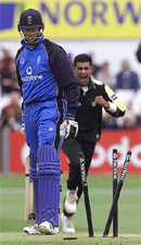 Pakistan's Waqar Younis celebrates taking the wicket of England's opening batsman Marcus Trescothick at Headingley, on Sunday.