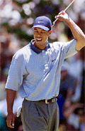 Tiger Woods reacts after missing a birdie putt on the fifth hole during third round play at the 101st US Open at Southern Hills Country Club in Tulsa on Saturday. 