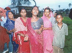Relatives of the victims who were electrocuted when they came in contact with a high-tension wire at Gopalpur village on the Patna-Gaya road on Monday. 