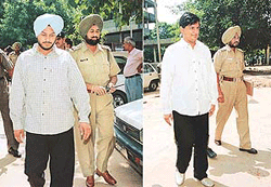 Ranjit Bajaj and Jagtinder Pal Singh Bagga (left), who were booked for apprehension of breach of peace, being produced in the court of the SDM (central) in Sector 17 on Monday in Chandigarh. 
