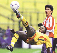 Ghana's Patrick Villars kicks the ball while Paraguary's Santiago Salcedo looks on during their first round match of the FIFA Youth World Championship in Mar del Plata's Jose Maria Minella Stadium, on Monday. 