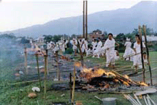 Mass cremation of bodies of 13 victims in Imphal on Wednesday.