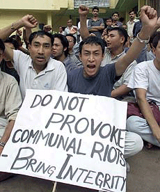 Manipuri students shout slogans against the federal government in Kolkata on Wednesday.