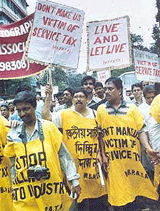 A rally against imposition of 5 per cent service tax on photographic goods in Kolkata on Thursday. 