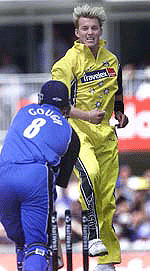 Australia's pace bowler Brett Lee (R) celebrates taking the wicket of England's Darren Gough for a duck on Thursday.
