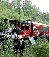 German rescue workers inspect a gutted train after a crash in Vilseck, near Amberg, on Friday.