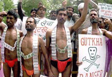Activists of National Human Rights Council demonstrating near Parliament in New Delhi on Sunday.