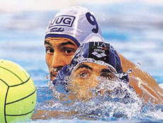 Italian Carlo Silipo fights for a ball with Yugoslavian Alexander Ciric (L) during their Waterpolo European Championships final match in Budapest on Sunday. 