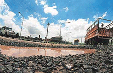 A two-foot-deep pothole in the middle of the main road behind the upcoming Sports Complex in Phase IX is proving to be a virtual death-trap for road users. 