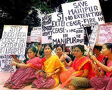 Members of the Integrated Manipuri Association, a body of Manipuri people living in Bangladesh, stage a sit-in in Dhaka. 