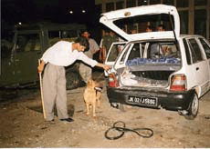 Securitymen inspecting the site at the Jammu railway station where a powerful bomb exploded on Monday night.
