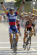 Russia's Sergei Ivanov (L) raises his arms ahead of Kazakhstan's Alexandre Vinokourov (C) and Laurent Jalabert of France (R) as he crosses the finish line of the 174-km sixth stage of the Tour of Switzerland cycling race in Mendrisio, Switzerland, on Sunday. 