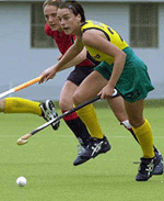 Australian women's team Player Joanne Banning (R) fights with England's Walker Rachel Walker during the 3rd KT Cup International Women's Hockey Tournament in Seongnam on Wednesday. 
