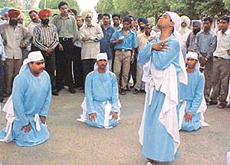 Artistes of Lucknow enact a scene of the play Life After Death, in Ludhiana on Friday. 